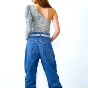 Silver One-Shoulder Top with Blue Jeans
